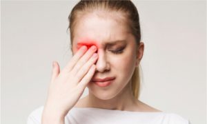 The girl experiences severe eye pain from trauma